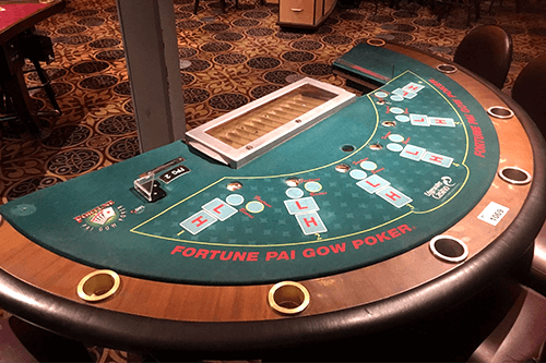 Play Pai Gow Poker  - Live Casino Table